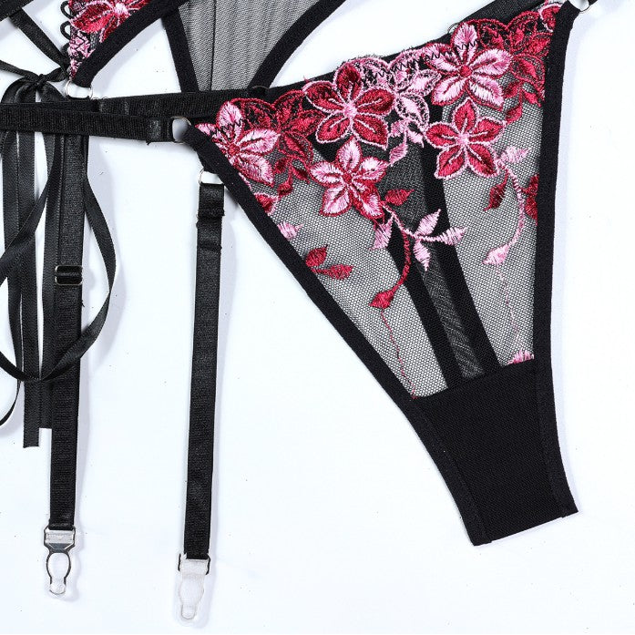 Embroidered design on three-piece lingerie set