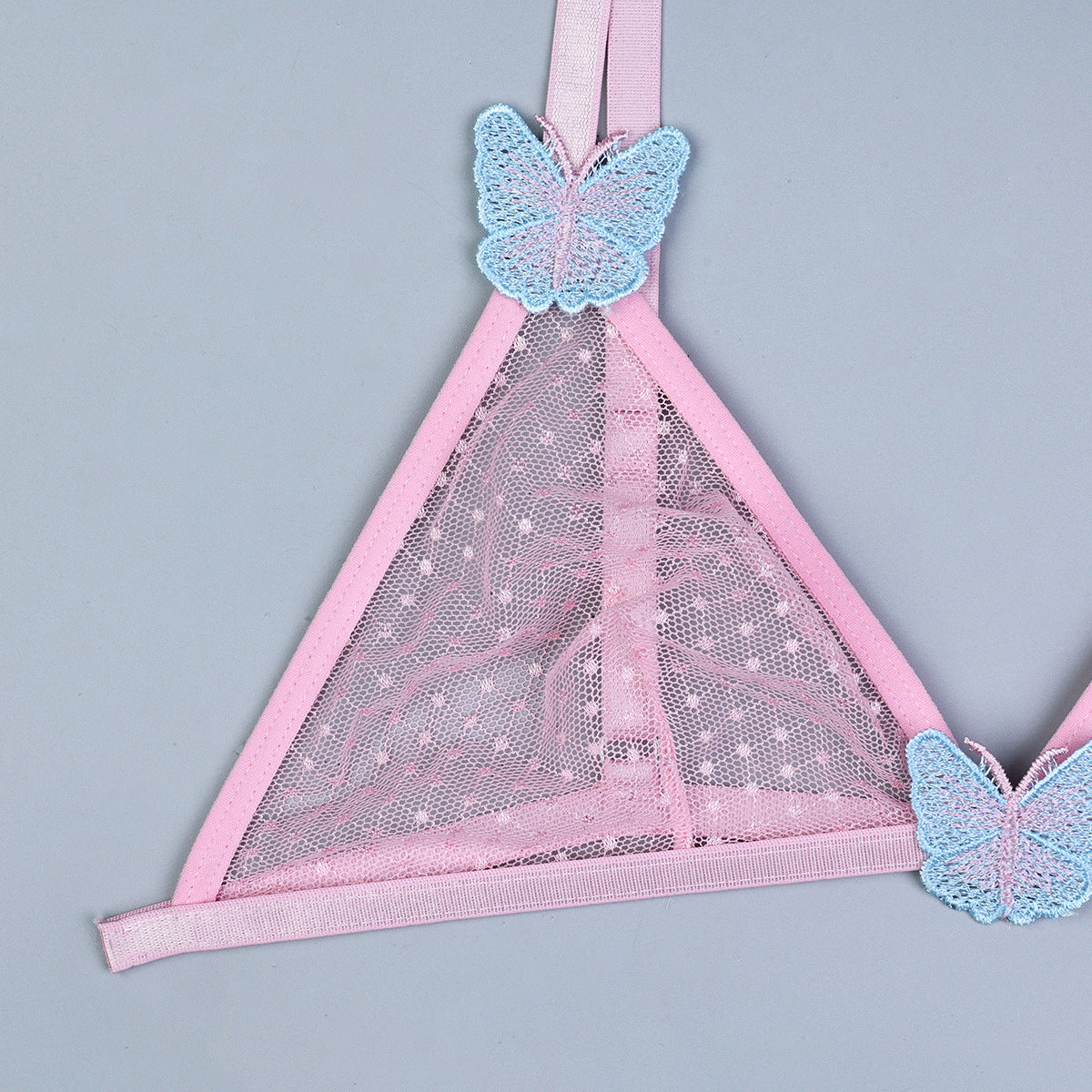 Pink lingerie set featuring embroidered