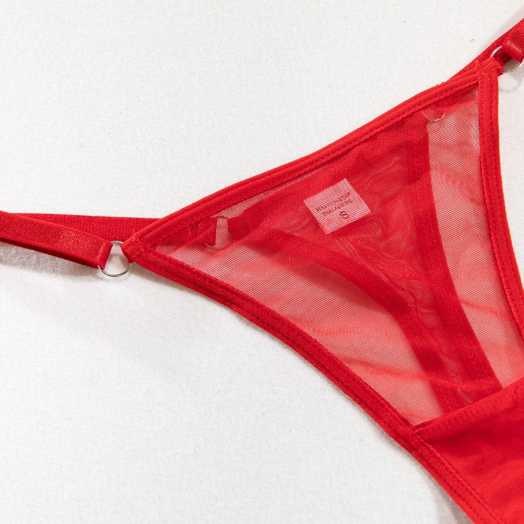 Red lingerie bodysuit with sheer mesh design