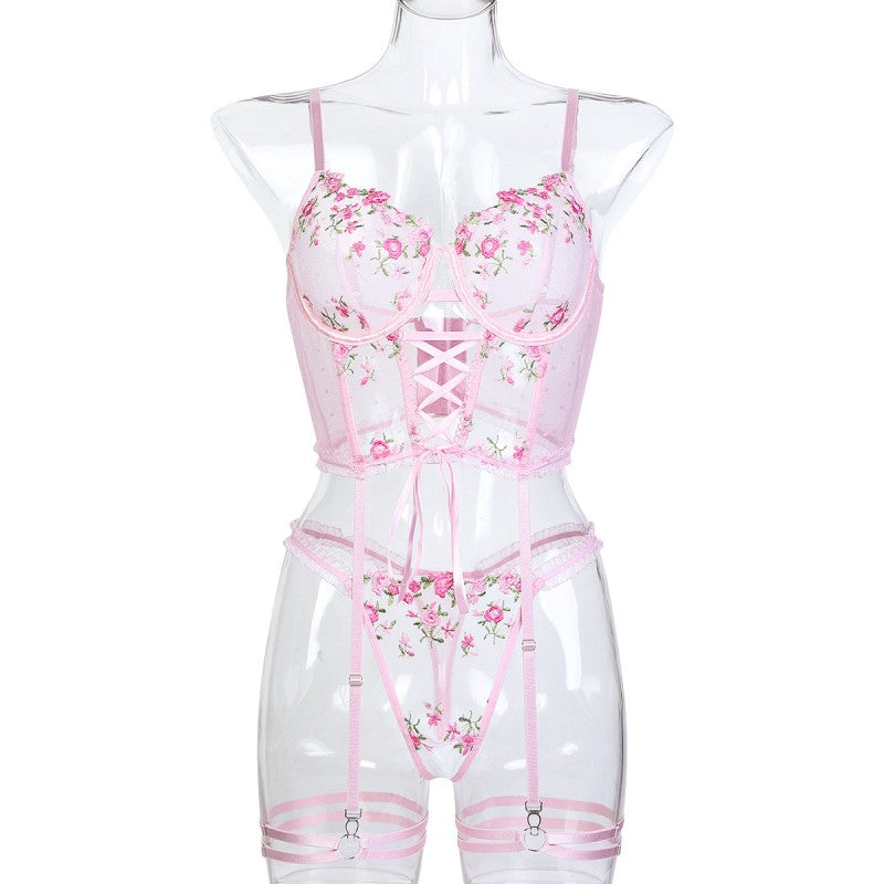 Three-piece lingerie set styled with floral embroidered