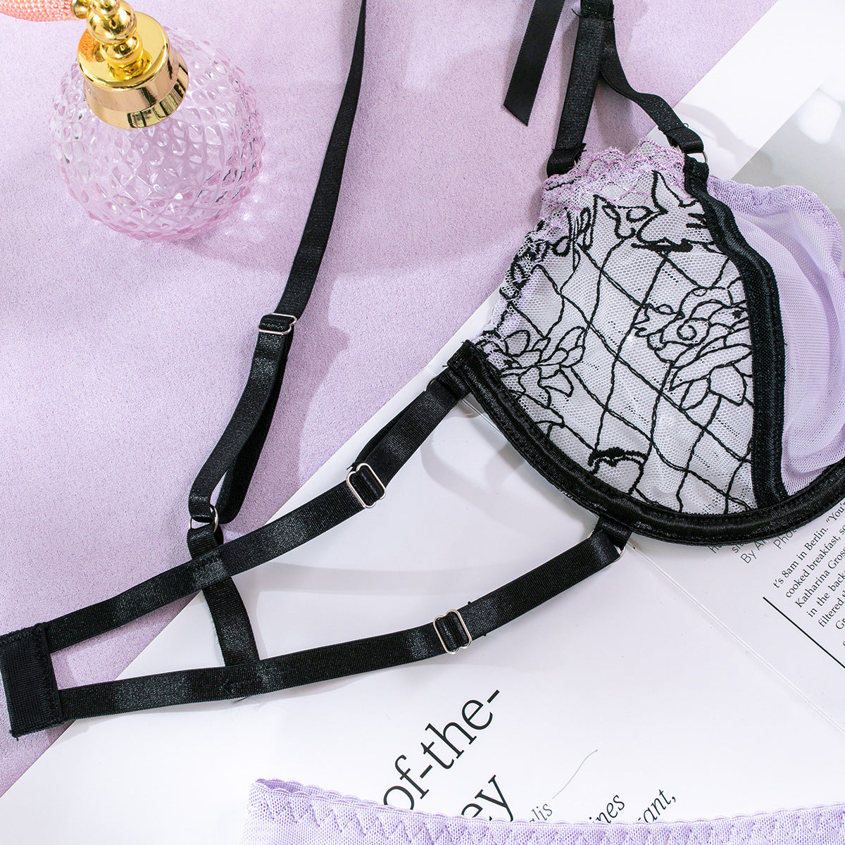 Purple bow detailed three-piece lingerie set