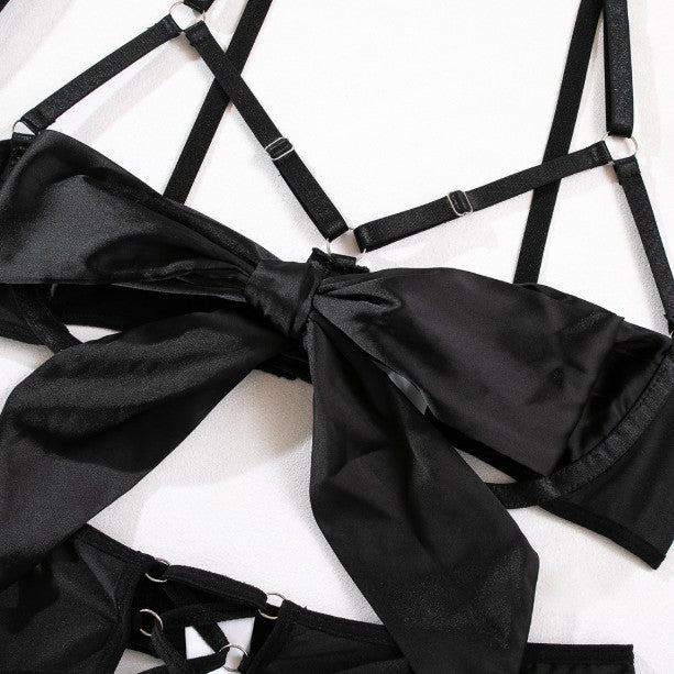 Bow accents on five-piece lingerie set