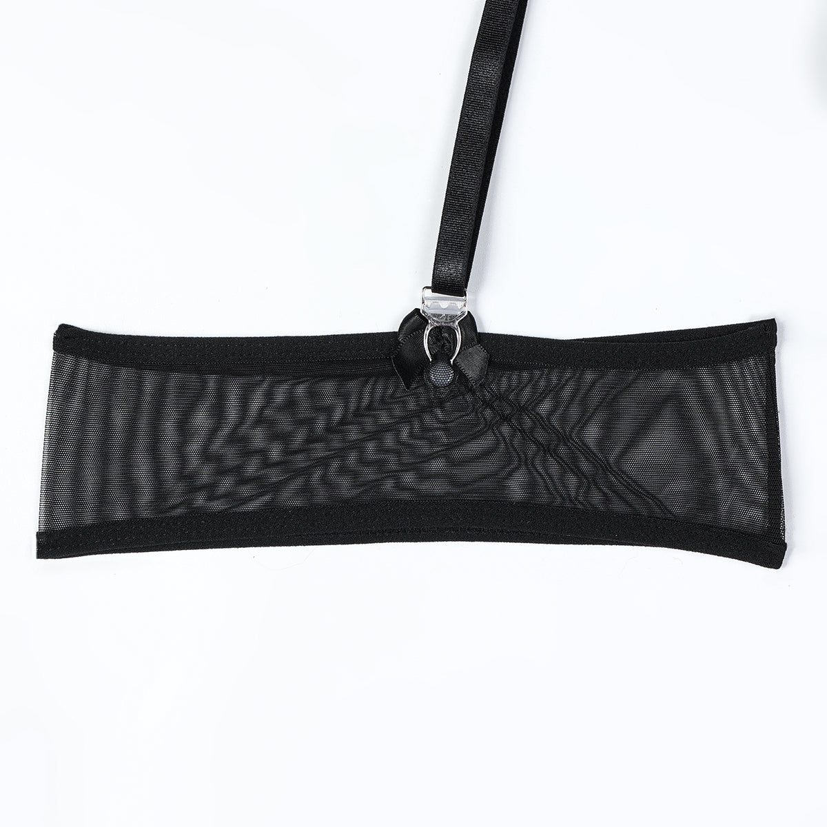 Three-piece lingerie set styled with sheer mesh