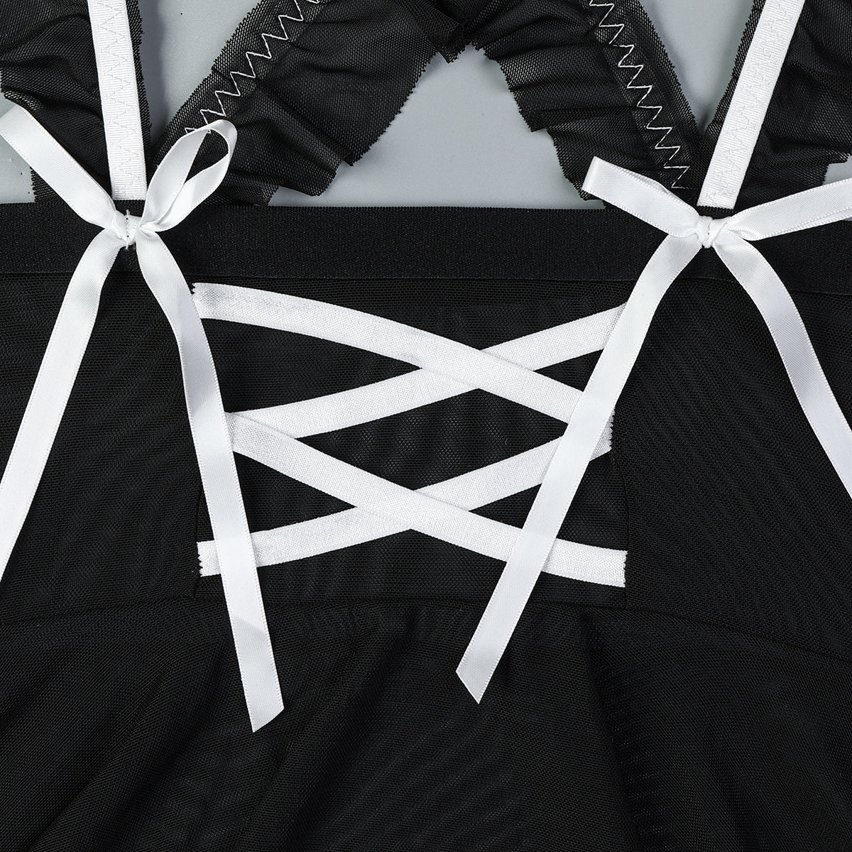 Maid-inspired lingerie set with fishnet design
