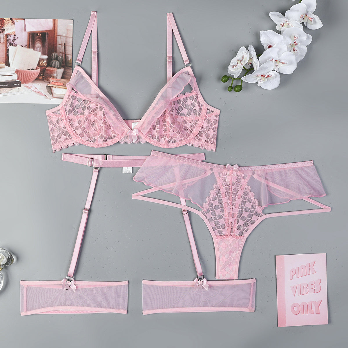 Strappy accents on three-piece lingerie set