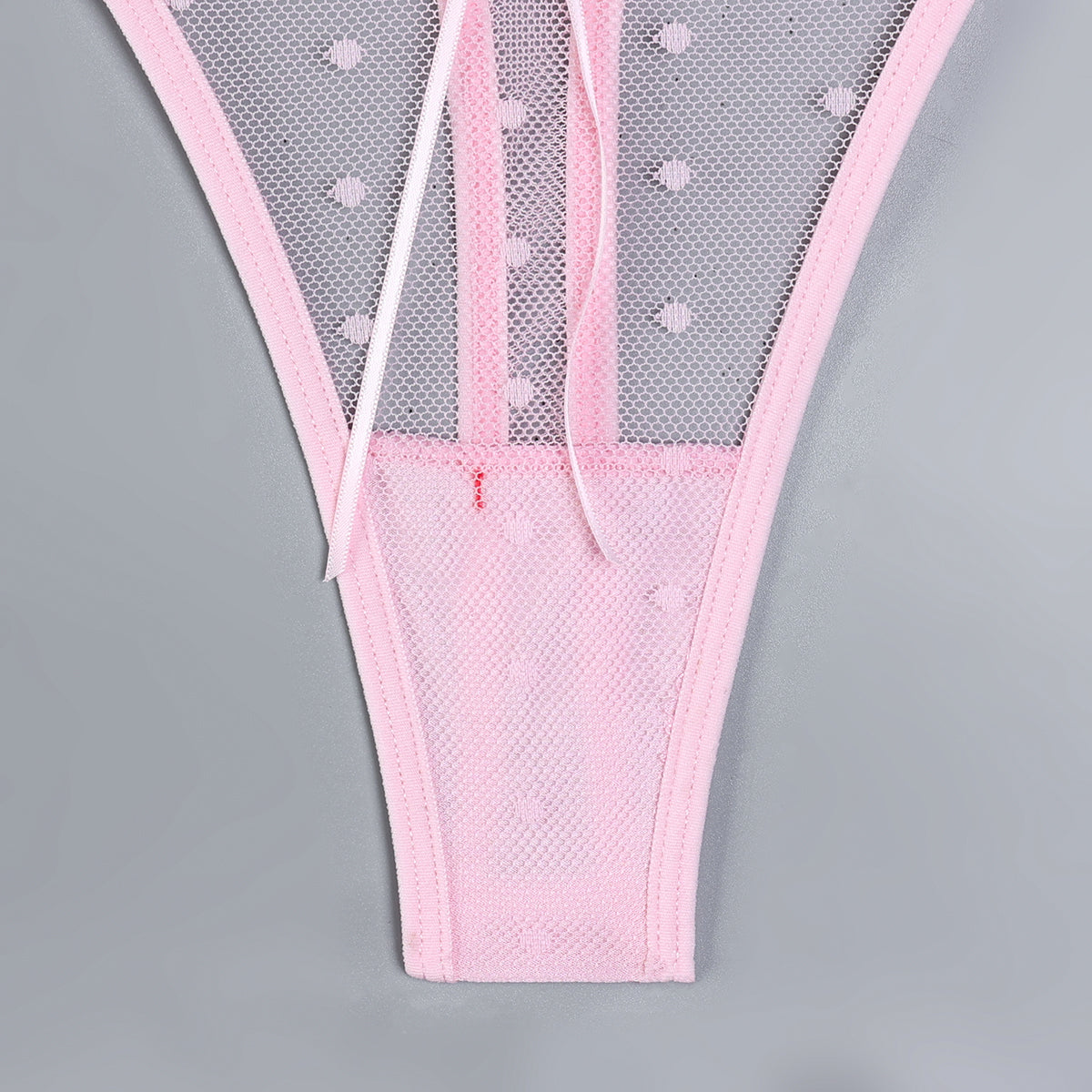 Pink three-piece lingerie set with underwire design