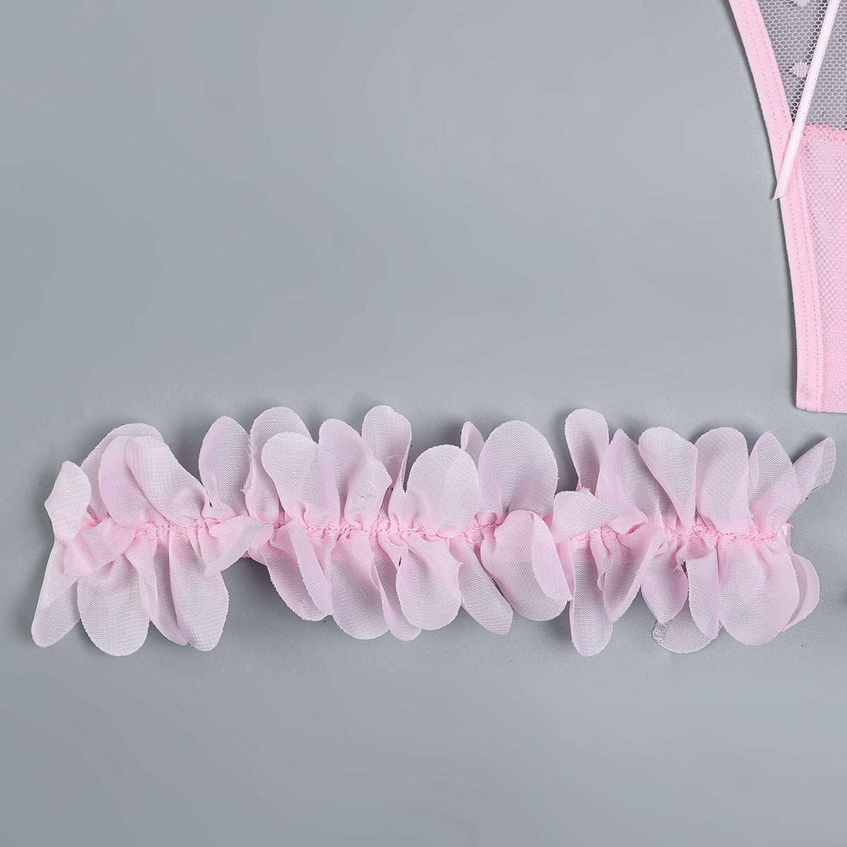 Pink embroidered three-piece lingerie set