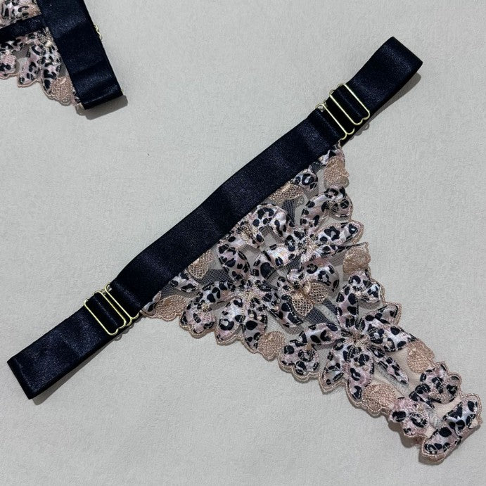 Embroidered design on five-piece lingerie set