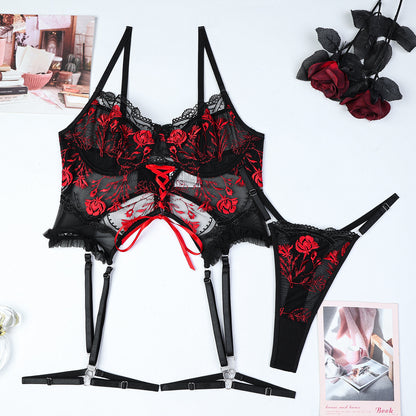 Red strappy three-piece lingerie set