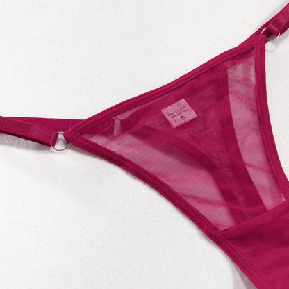 Red lingerie bodysuit with sheer mesh design