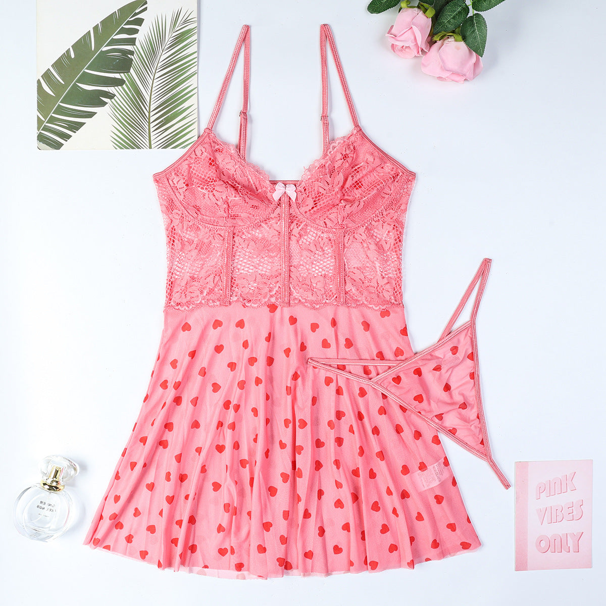 Pink babydoll lingerie dress with lace design