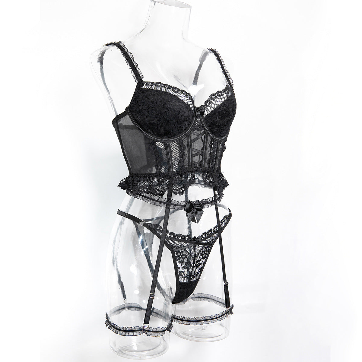 Cutout accents on black three-piece lingerie set