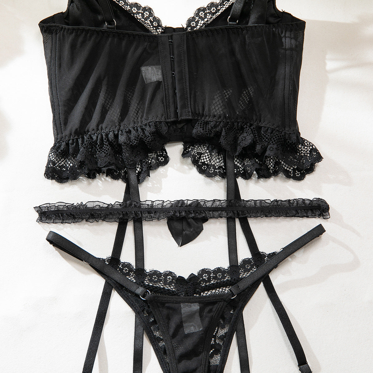 Lace design on three-piece lingerie set