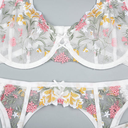 White three-piece lingerie set featuring underwire