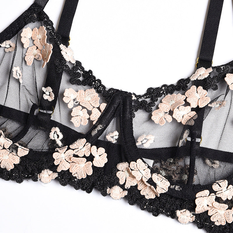 Three-piece lingerie set featuring embroidered