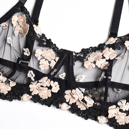Three-piece lingerie set featuring embroidered