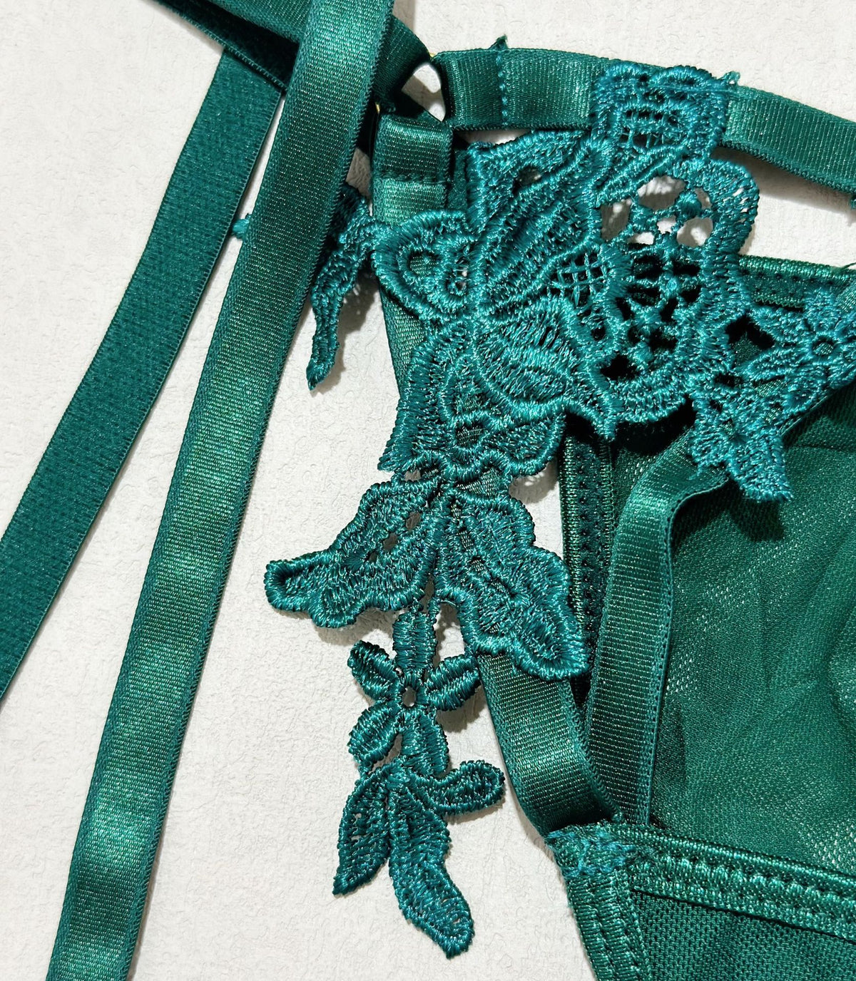 Green lace three-piece lingerie set