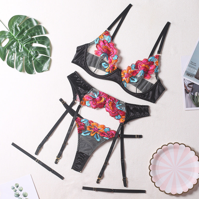 Four-piece lingerie set with garter straps design