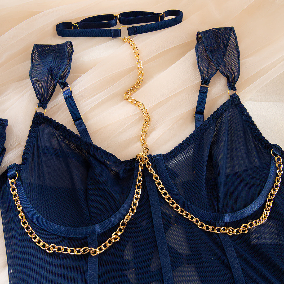 Four-piece lingerie set with sheer mesh design