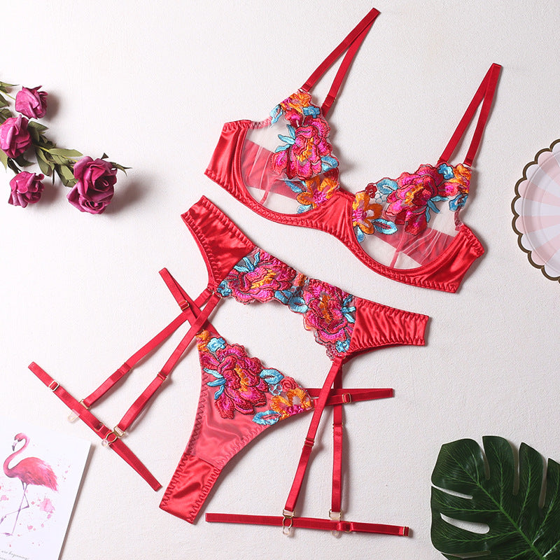 Sheer mesh accents on four-piece lingerie set