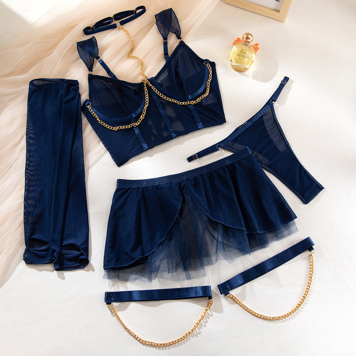 Underwire accents on four-piece lingerie set
