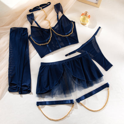 Underwire accents on four-piece lingerie set