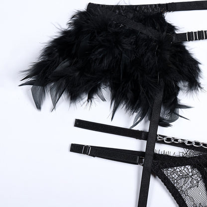 Harness accents on three-piece lingerie set