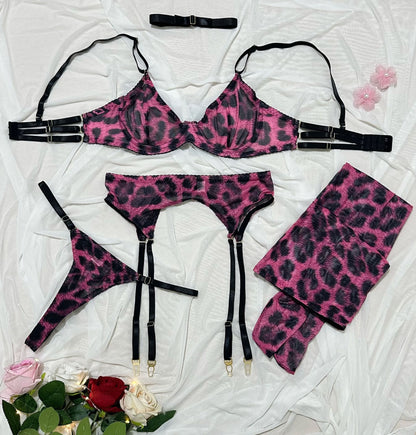 Harness accents on five-piece lingerie set