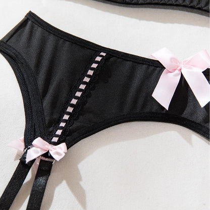 Four-piece lingerie set featuring lace