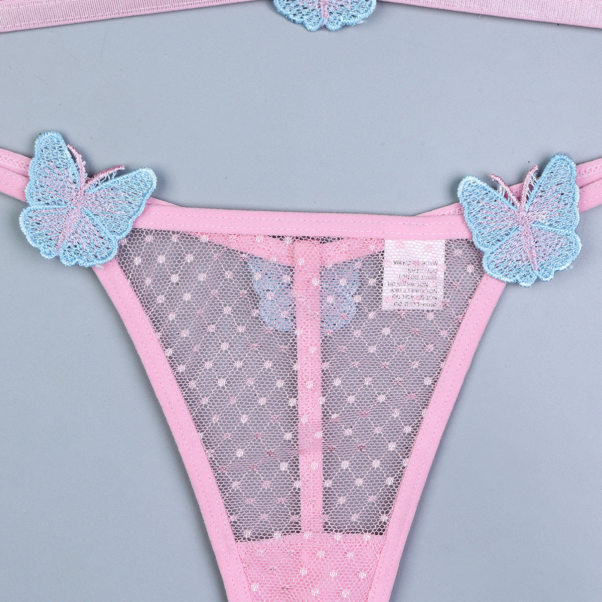 Pink embroidered lingerie set design details