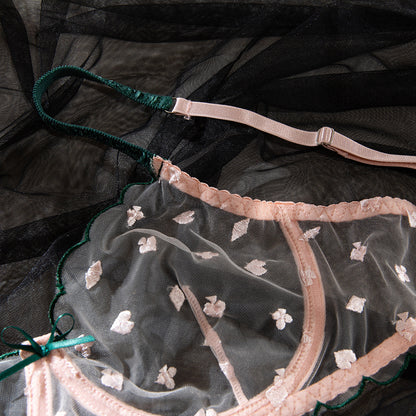 Pink lingerie set featuring sheer mesh