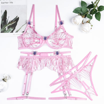 Three-piece lingerie set styled with embroidered