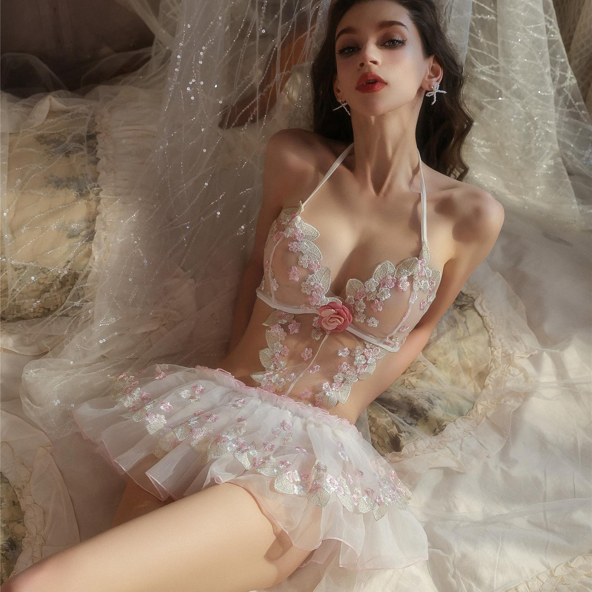 Ruffle accents on pink babydoll lingerie set