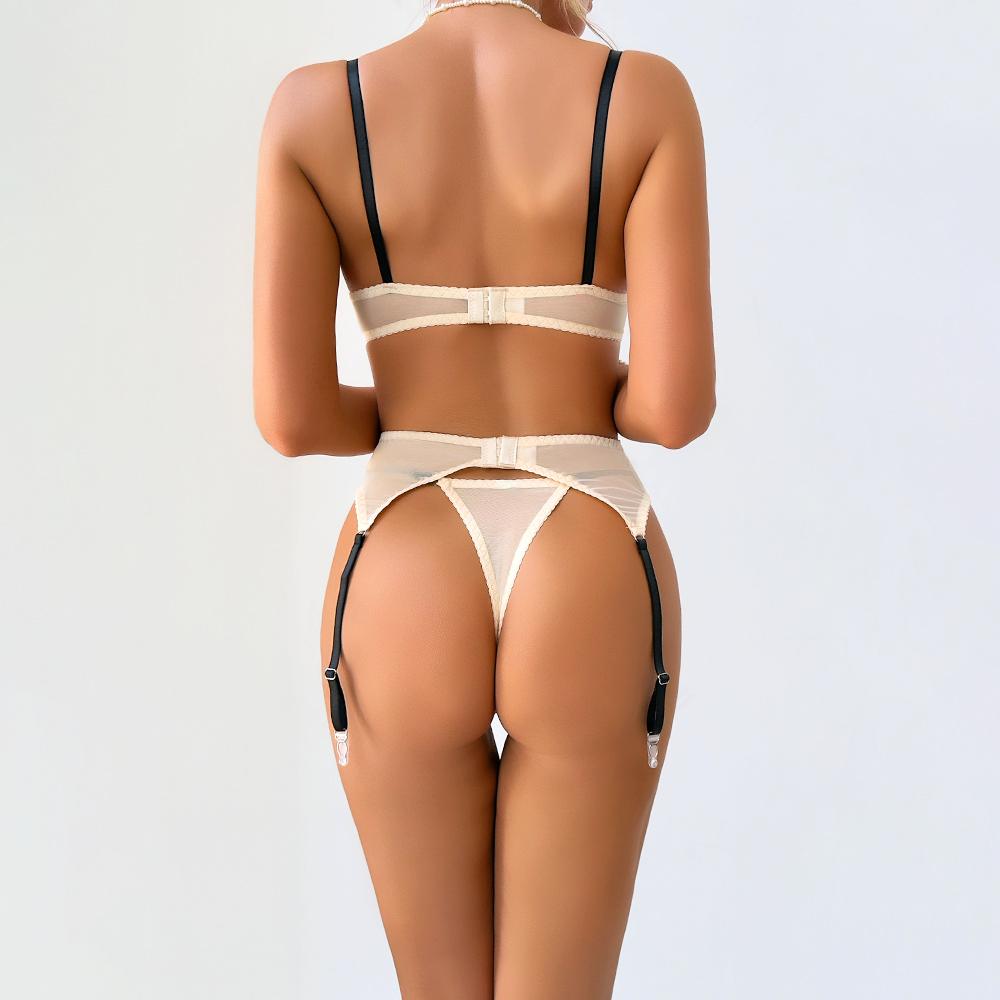 Black three-piece lingerie set featuring embroidered