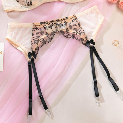 Embroidered design on three-piece lingerie set