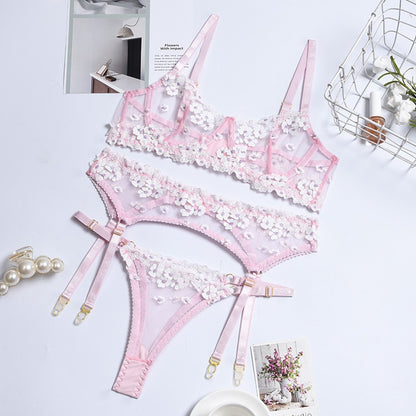 Sheer mesh accents on three-piece lingerie set