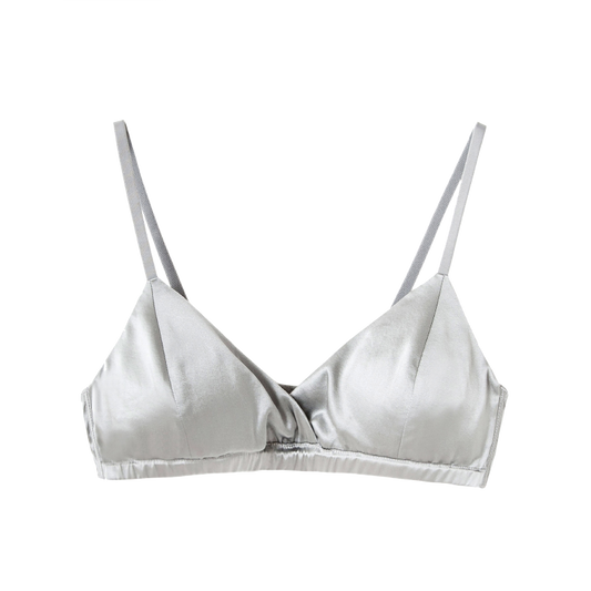 Silver silk bra with adjustable straps and a seamless design, providing luxurious comfort and support.