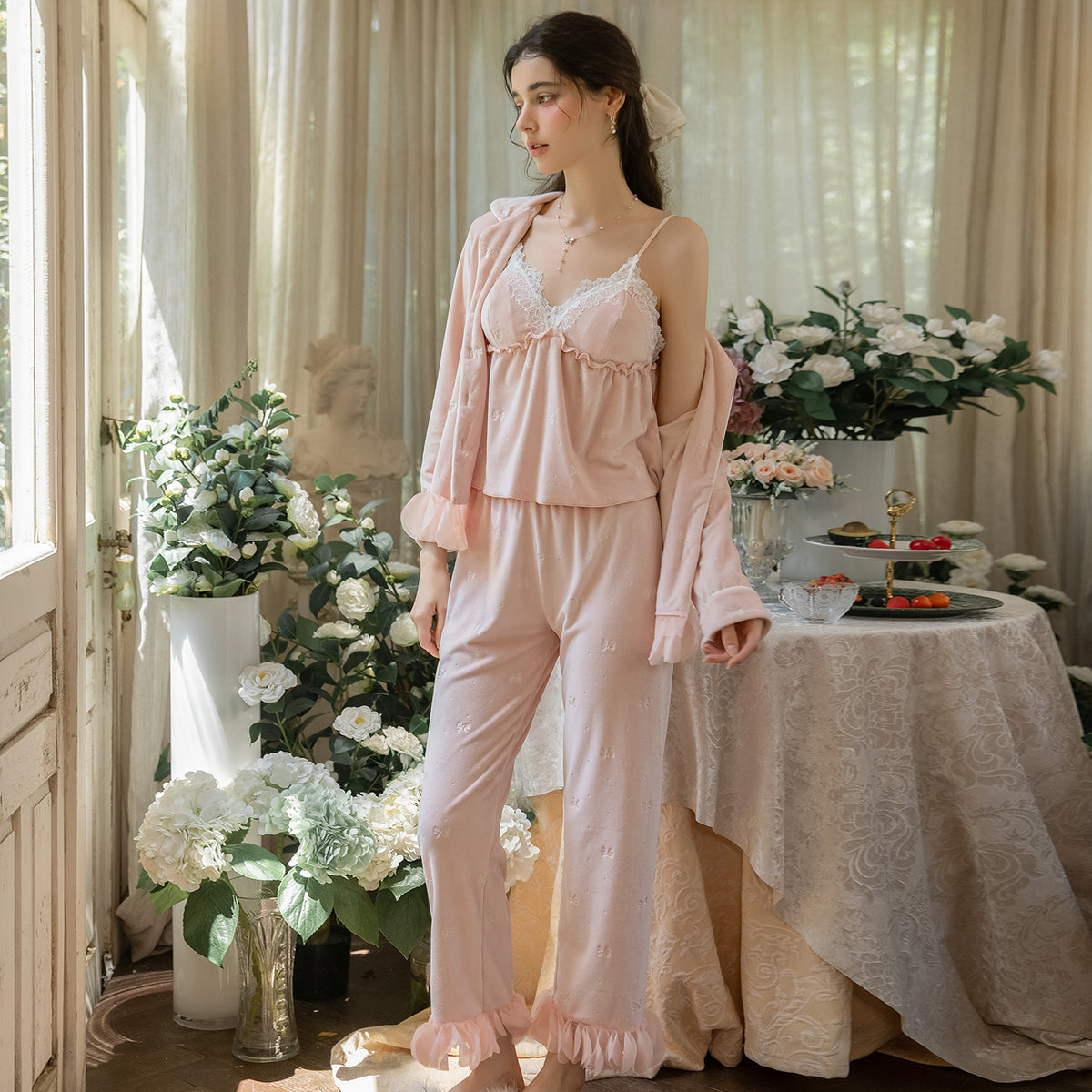 Blush pink floral pajama set styled with the long-sleeve cardigan open over the lace cami
