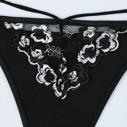 Black bra and panty set featuring floral