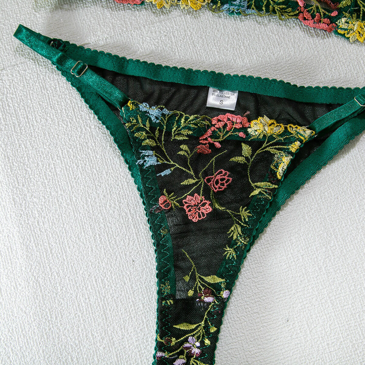 Corset lingerie set styled with floral embroidered