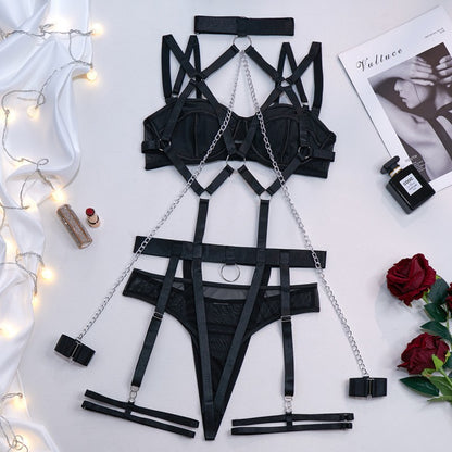 Four-piece lingerie set styled with strappy