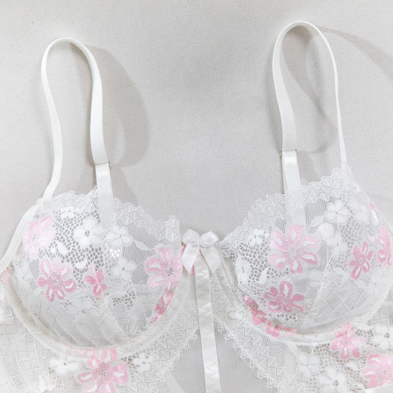 Four-piece lingerie set with floral embroidered details