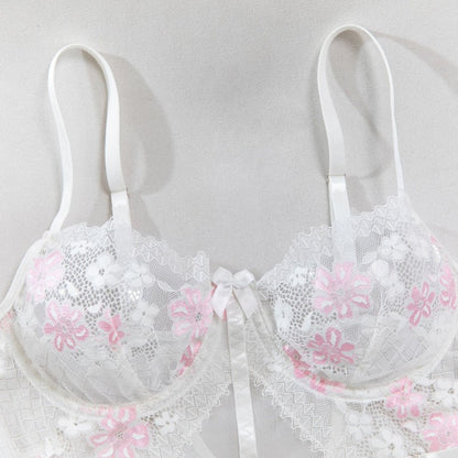 Four-piece lingerie set with floral embroidered details