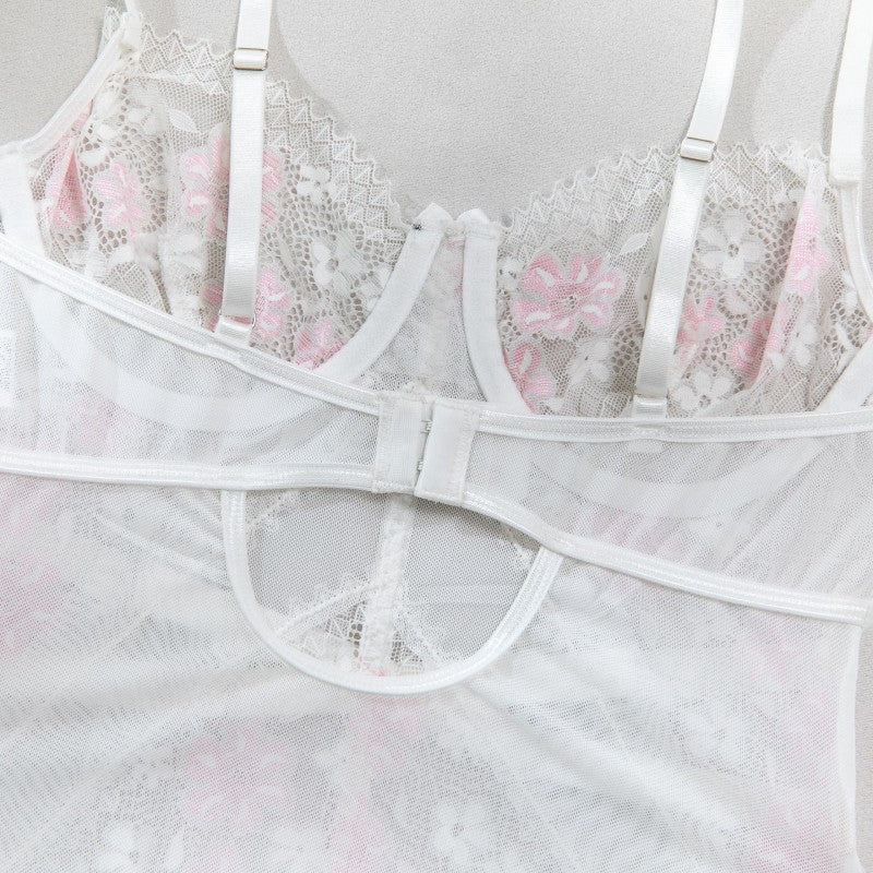 Four-piece lingerie set featuring sheer mesh