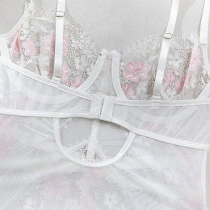 Four-piece lingerie set featuring sheer mesh