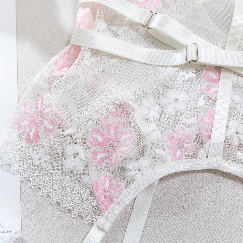 Lace design on four-piece lingerie set