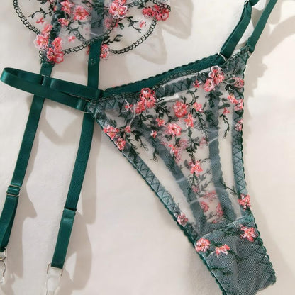 Embroidered design on four-piece lingerie set