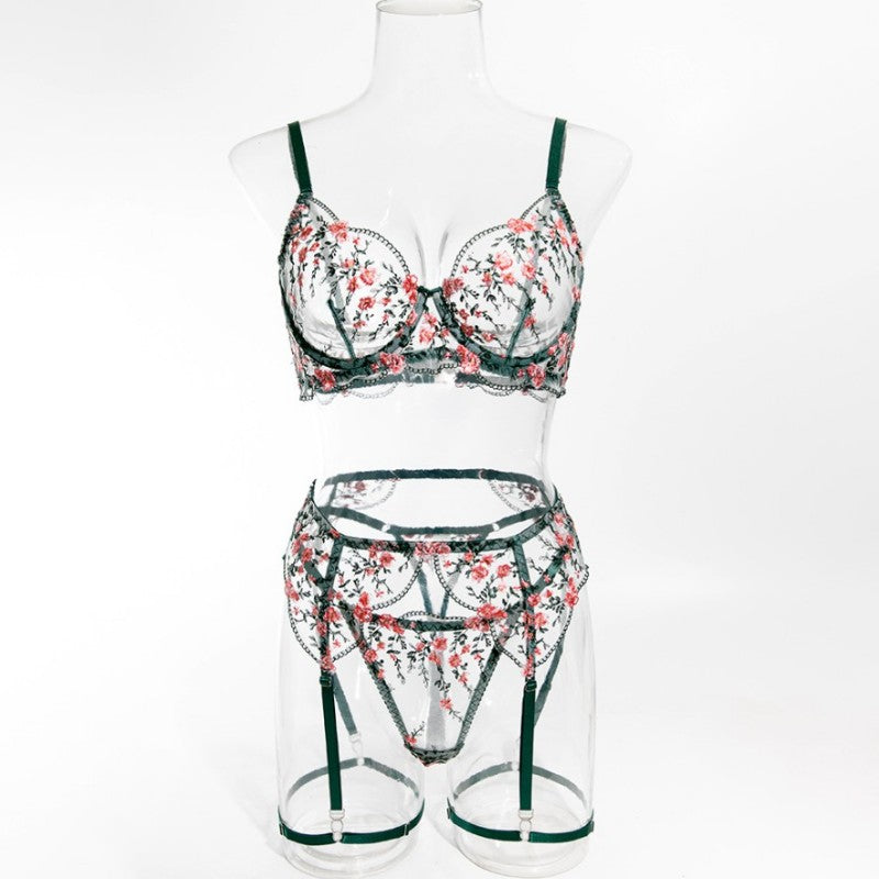 Floral accents on green four-piece lingerie set