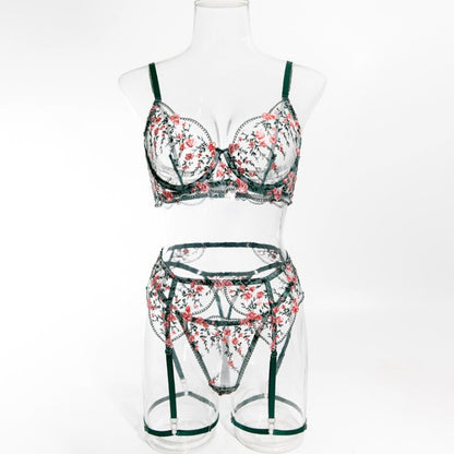 Floral accents on green four-piece lingerie set
