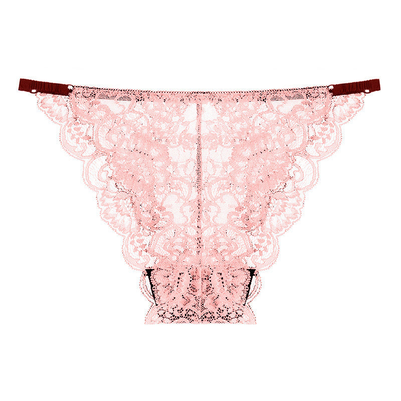 Pink low-waist thong with intricate floral lace design, featuring breathable fabric and lifting support.